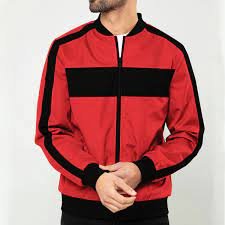 An orange painted blue, cut in half laying on a blue background